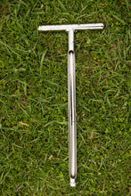 Oakfield Apparatus Compact one-piece soil probe model HA laying  in grass